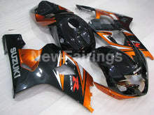 Cargar imagen en el visor de la galería, Black and Orange Factory Style - GSX-R600 04-05 Fairing Kit